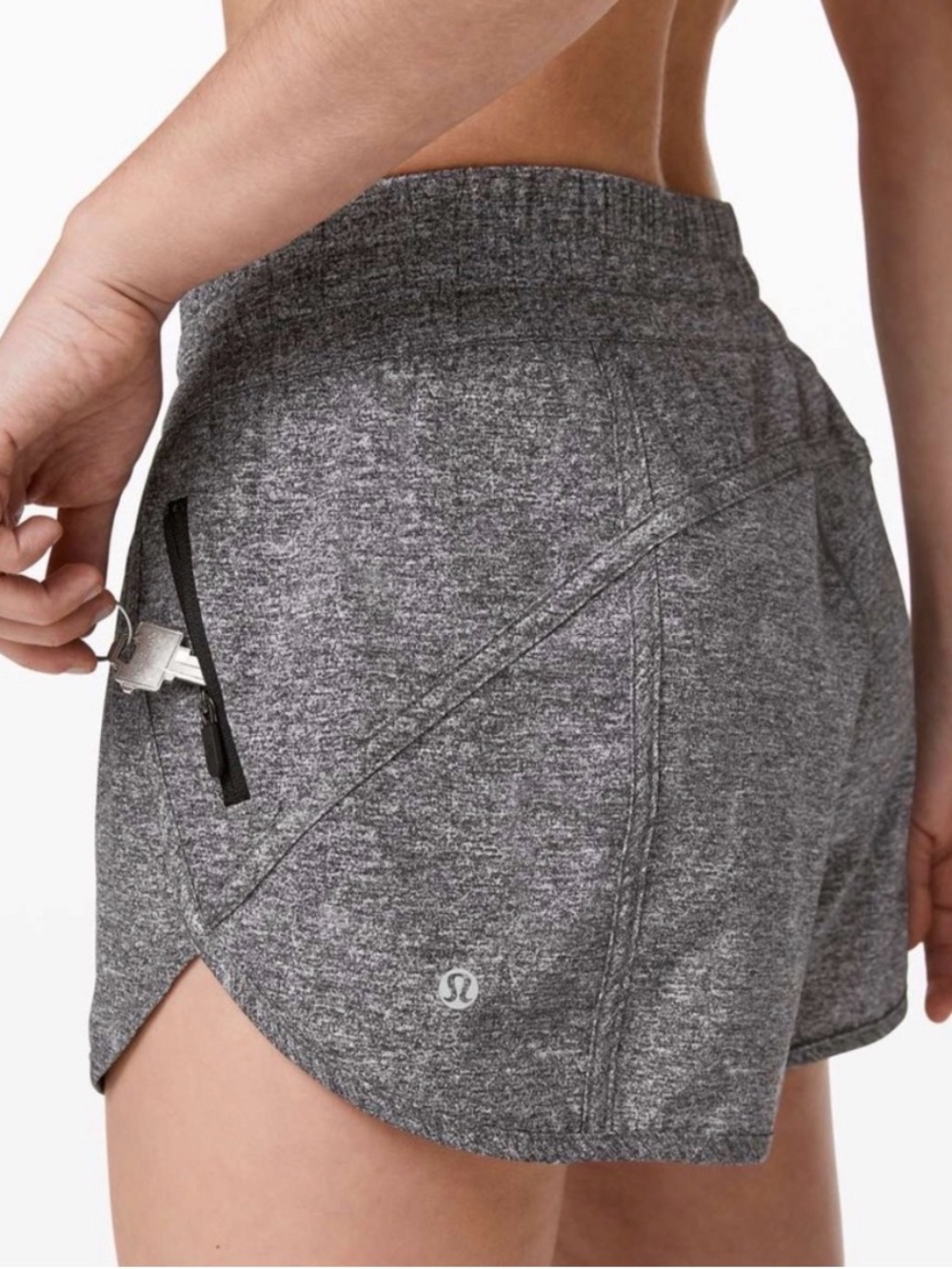 Lululemon Tracker Short V 4" in a Heather Lux Multi Black